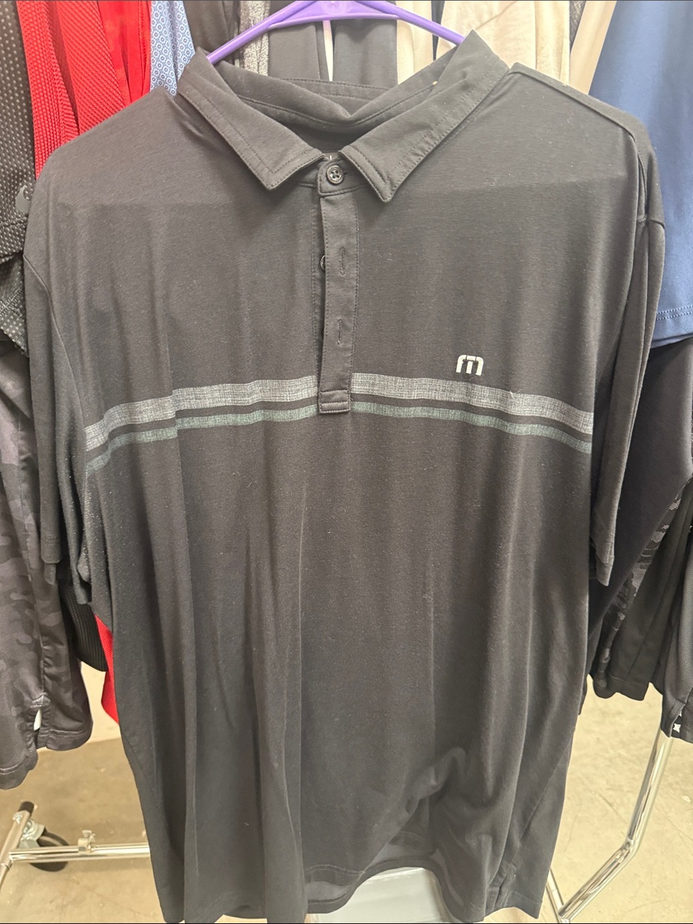 Travis Mathew Black Polo with Gray Stripe Detail